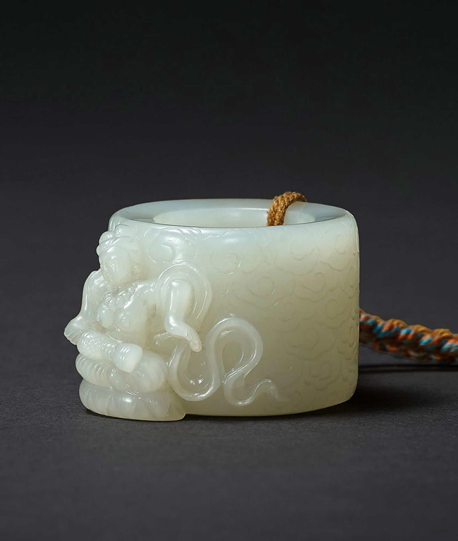 A White Jade 'Apsara' Archer's Ring, Qing Dynasty (1 of 1)