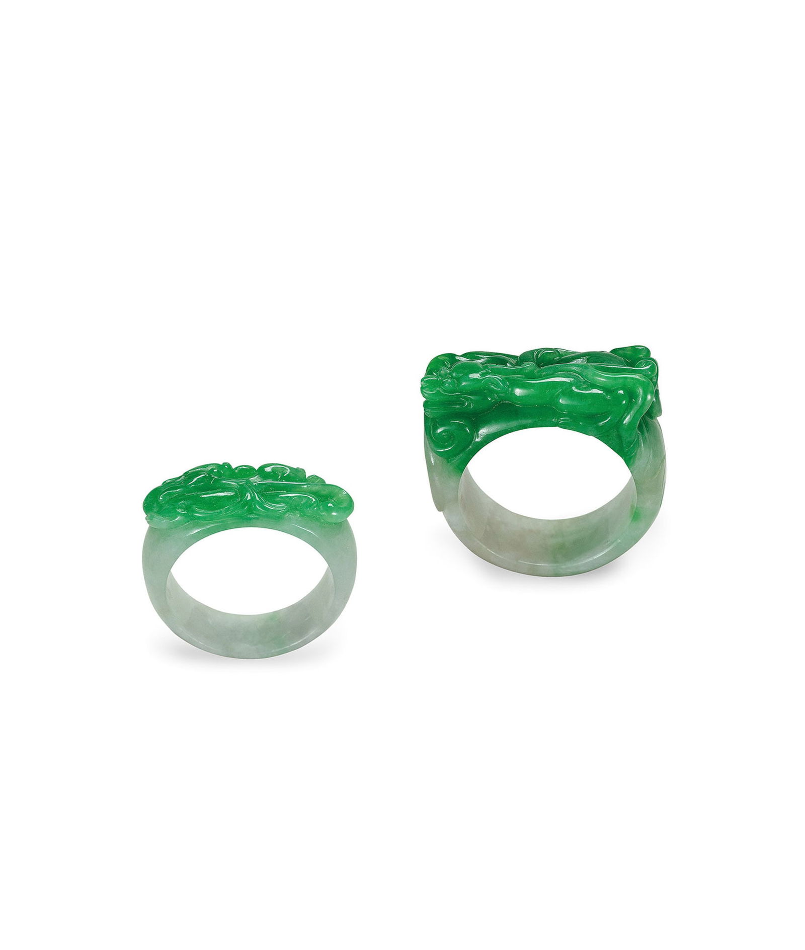 A Set of Two Jadeite 'Dragon' Saddle Rings: 298 天然翡翠龍紋馬鞍戒 二件一組 D2.3cm / D2.6cm 鑑定為A貨天然翡翠 預