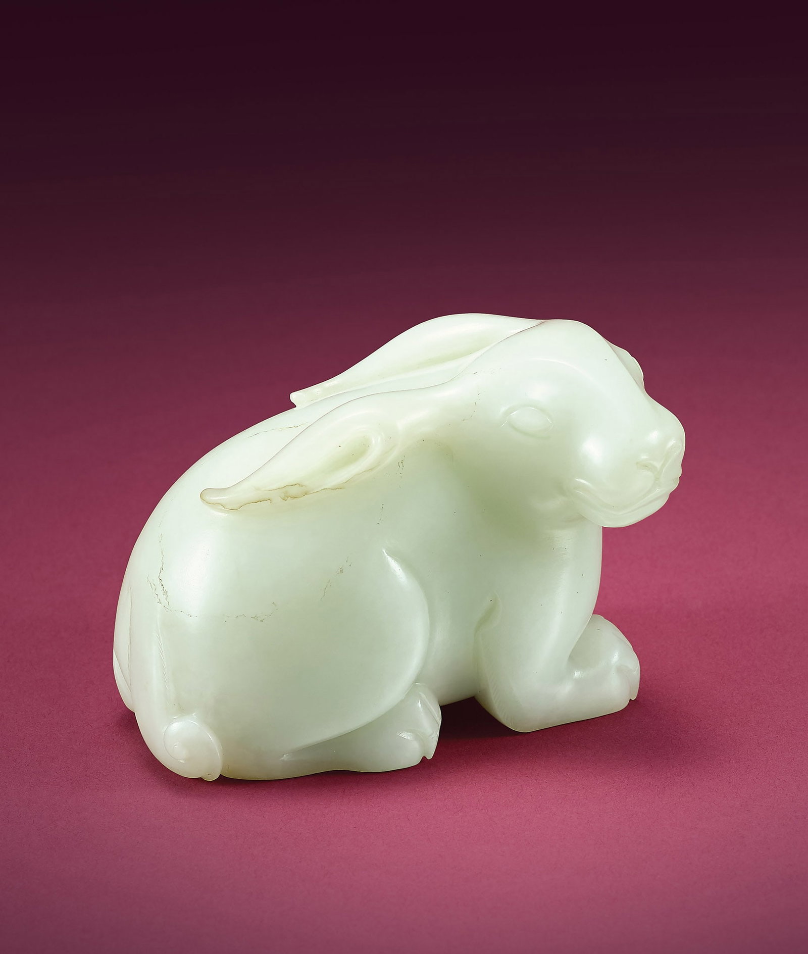 Inscribed White Jade Recumbent Rabbit, Qianlong: 211 清乾隆 白玉御題詩臥兔 L9.5cm 御題詩：秌暖無端遅桂芳 綴枝&#