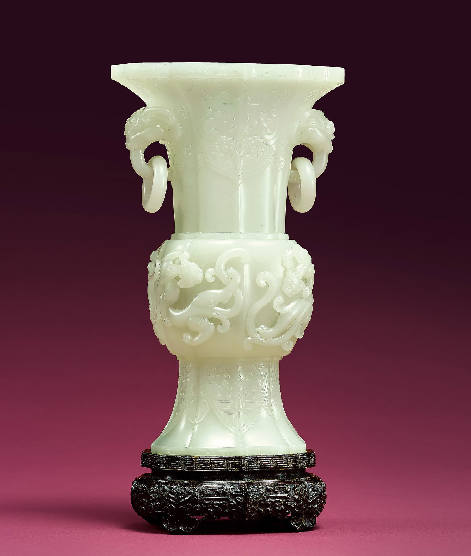 White Jade 'Dragon' Vase, Gu, Qianlong M&P: 220 清乾隆 白玉螭龍紋獸首銜活環耳花觚 「乾隆年製」款 H19.5cm &