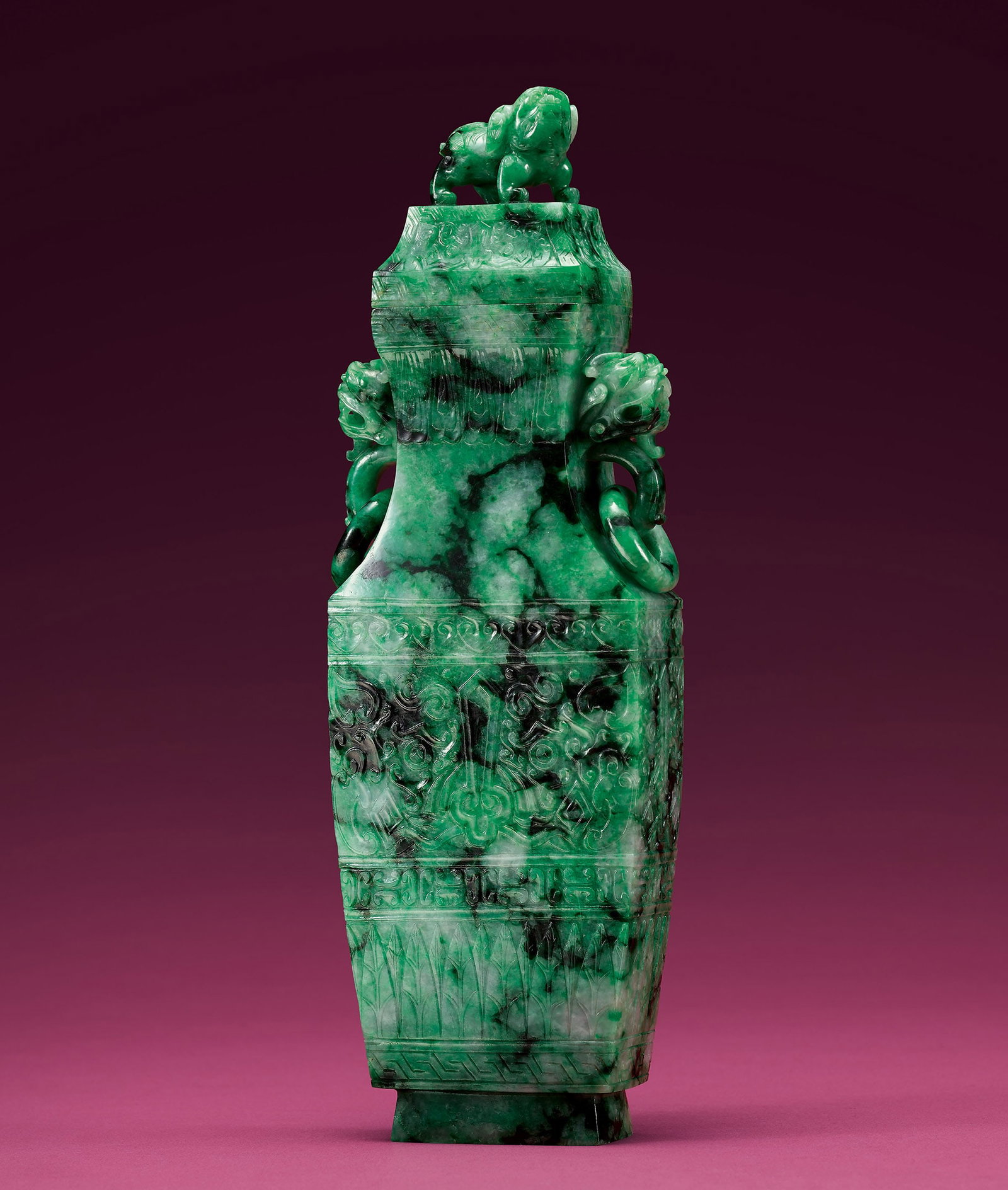 Archaic Jadeite 'Beast-Mask' Vase and Cover, Qing: 222 清 翠玉獸面紋獸首銜活環耳蓋瓶 H27.8 cm 來源：重要私人收藏&