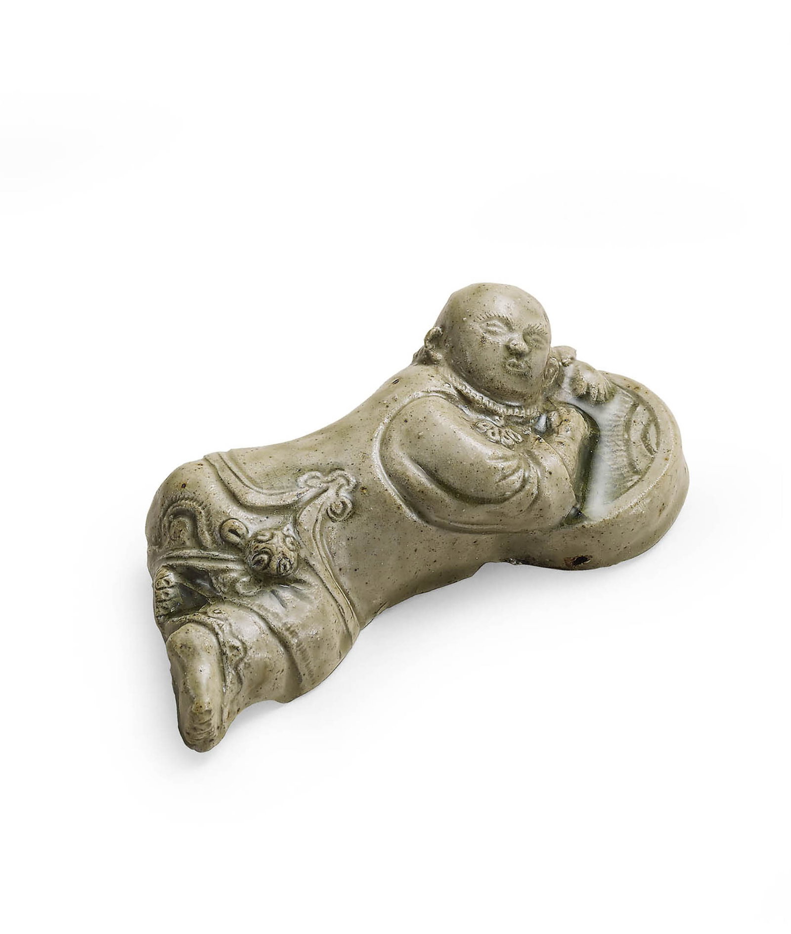 Yue Celadon-Glazed 'Boy' Brushrest, Song Dynasty: 519 宋 越窯青釉童子筆擱 L12cm 筆擱瓷胎，施青釉，釉色瑩潤。