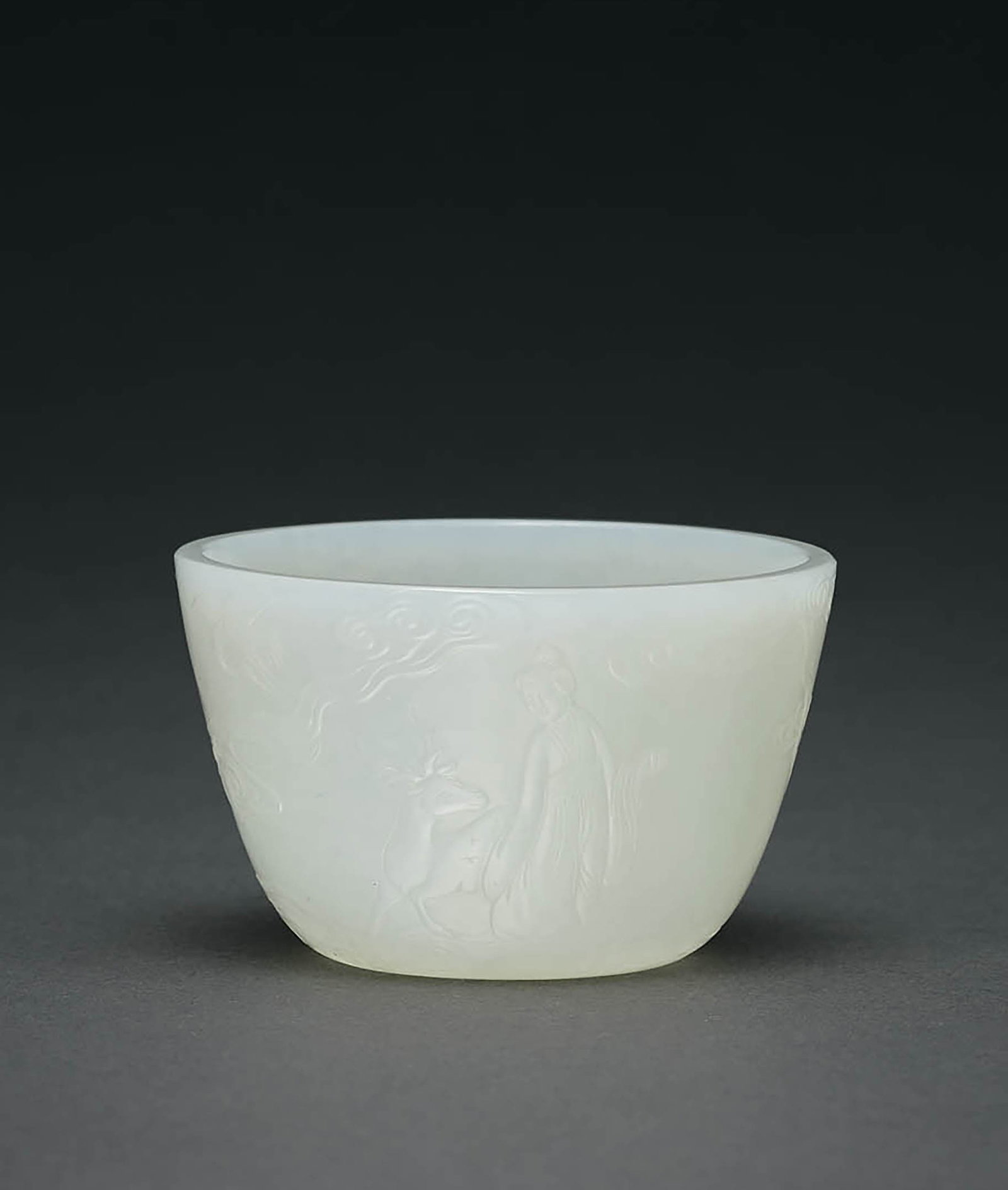 White Jade 'Magu and Poem' Cup, Qing Dynasty: 583 清 白玉麻姑獻壽圖詩文杯 H4.6cm 款識：凌霄玉女降凢眾 獻壽&#