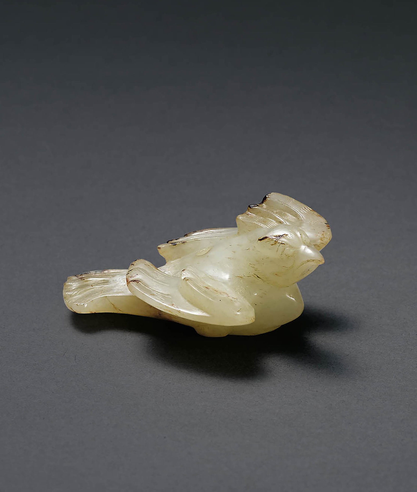 White Jade Phoenix, Ming or Earlier: 665 明或更早 白玉鳳鳥 L6.8cm 預估價： TWD 80,000-120,000 RMB 17,400-26,100 Yu Jen Taipei 台北宇珍拍