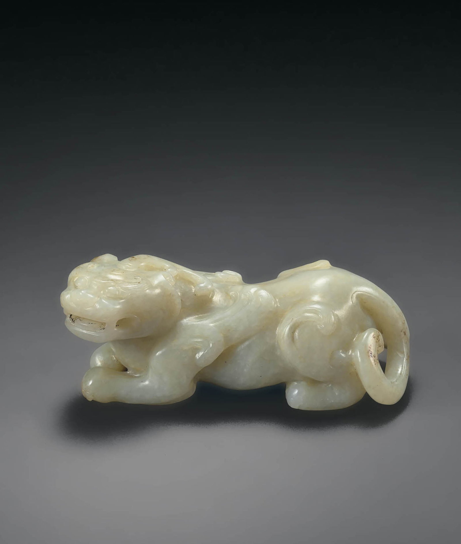 Rare Pale Celadon Jade Mythical Beast, Qing/Earlier: 672 清或更早 青白玉瑞獸 L12cm 來源：巴黎蘇富比2024年6月14日編號180 &