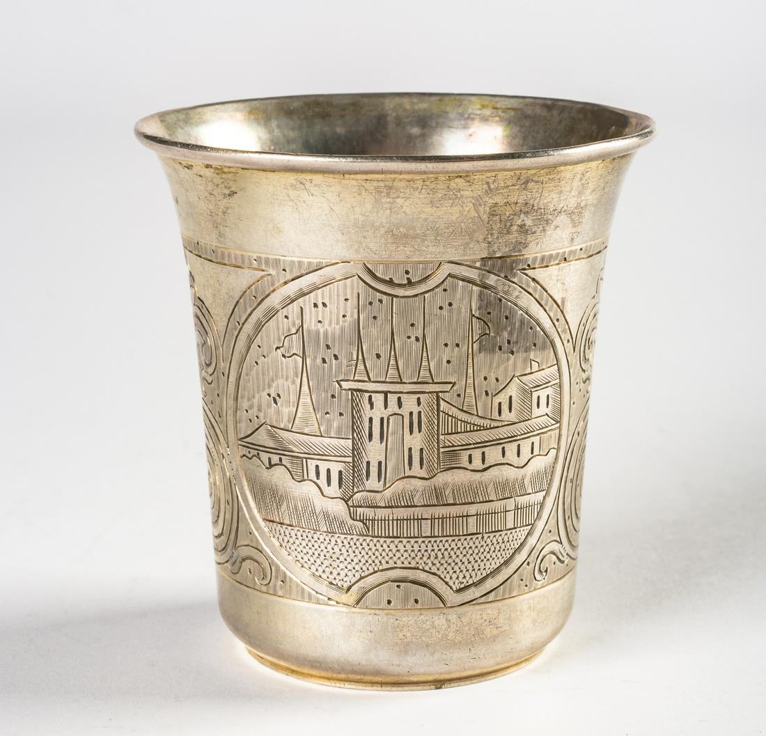 A RUSSIAN SILVER BEAKER WITH ORNAMENTS AND CITY VIEWS (1 of 2)