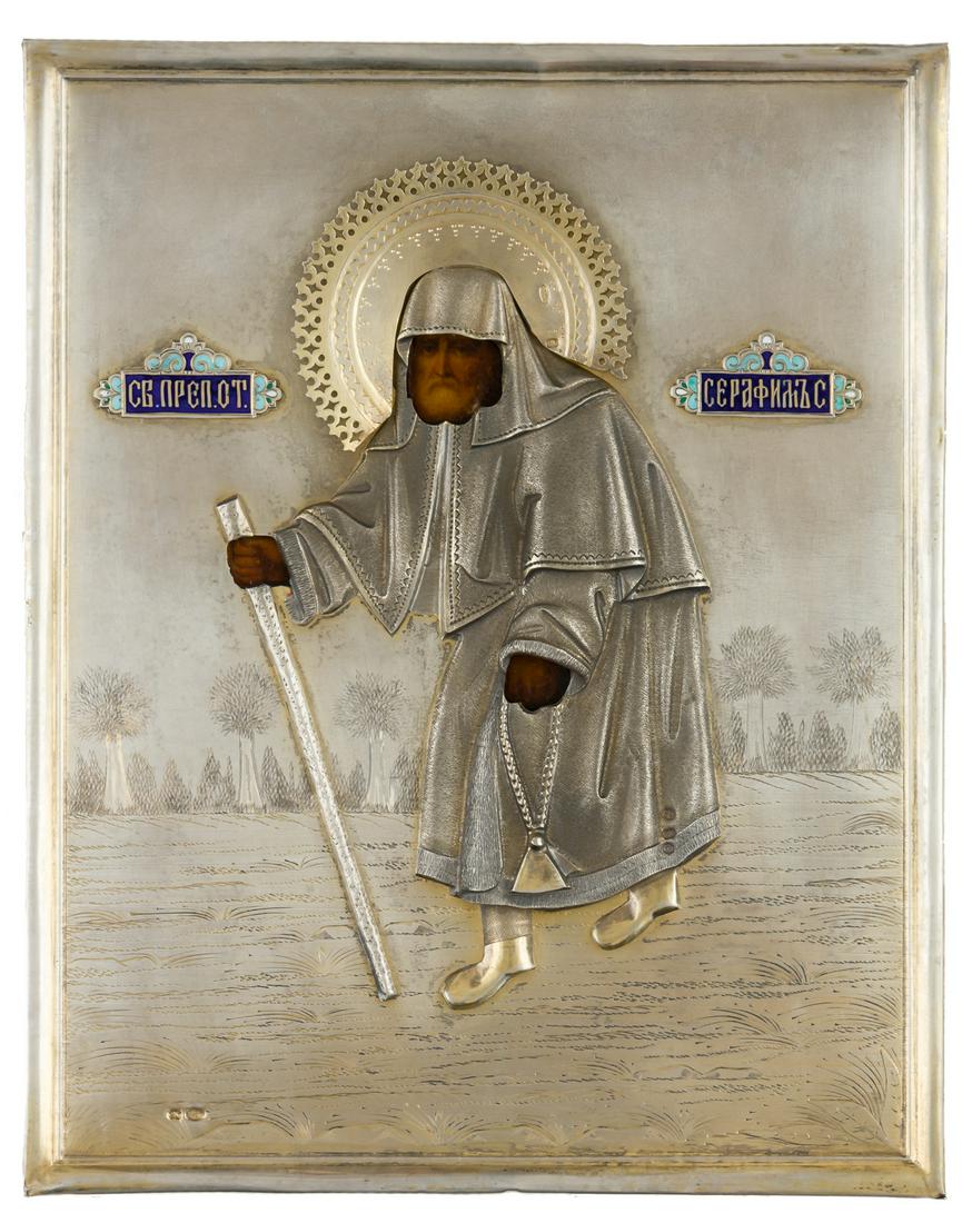 A RUSSIAN ICON WITH PARTLY GILDED SILVER OKLAD AND CLOISONNE ENAMEL SHOWING ST. SERAPHIM OF SAROV (1 of 7)