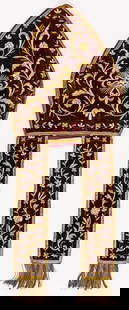 MITRE: Dark red velvet with rich gold embroidery and lavish gold fringes, slightly damaged, 19th c. L: 89 cm Provenance: Madre Pascalina Lehnert.