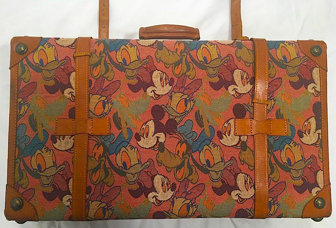 Vintage Disney Mickey Mouse Tapestry Leather Suitcase: Vintage Disney Mickey Mouse Tapestry Leather Suitcase. Designed, produced and authorized license FIONA TM House of Mercury LTD Hong Kong. Measures approximately 23.5" by 13.5" by 7.5" (in).