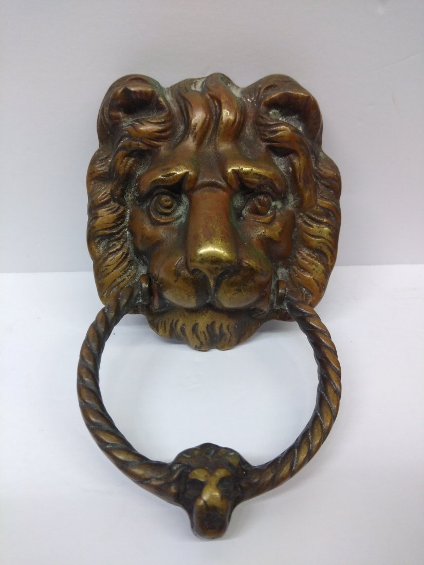 Vintage Large English Bronze Lion Head Door Knocker: Vintage Large English Bronze Lion Head Door Knocker. Not a cheap reproduction, Marked "England" on Back. Lion Head Measures approx 5.25" x 4.75", Ring Measures 4.25" in Diameter.