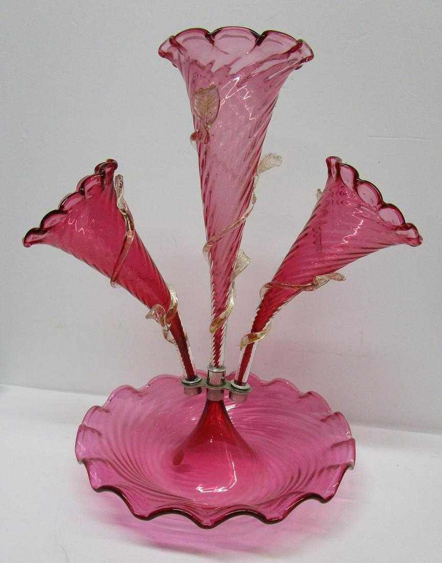 CRANBERRY VENETIAN ITALIAN MURANO ART GLASS EPERGNE: ANTIQUE CRANBERRY VENETIAN ITALIAN MURANO ART GLASS EPERGNE CENTERPIECE VASE with applied vines, Beautiful Condition. Still Has "Murano" Sticker. Approx 15" x 13"