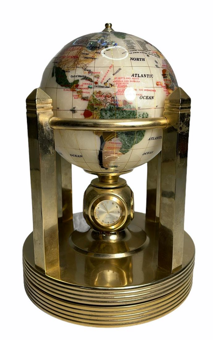 Beautiful Rotating Semi Precious Stone Desk Globe: Vintage. A Semi precious stone world globe in Rotating Chrome base. The base incorporates 2 x barometers and 2 clocks. 1" Tall x 8" W (inches).