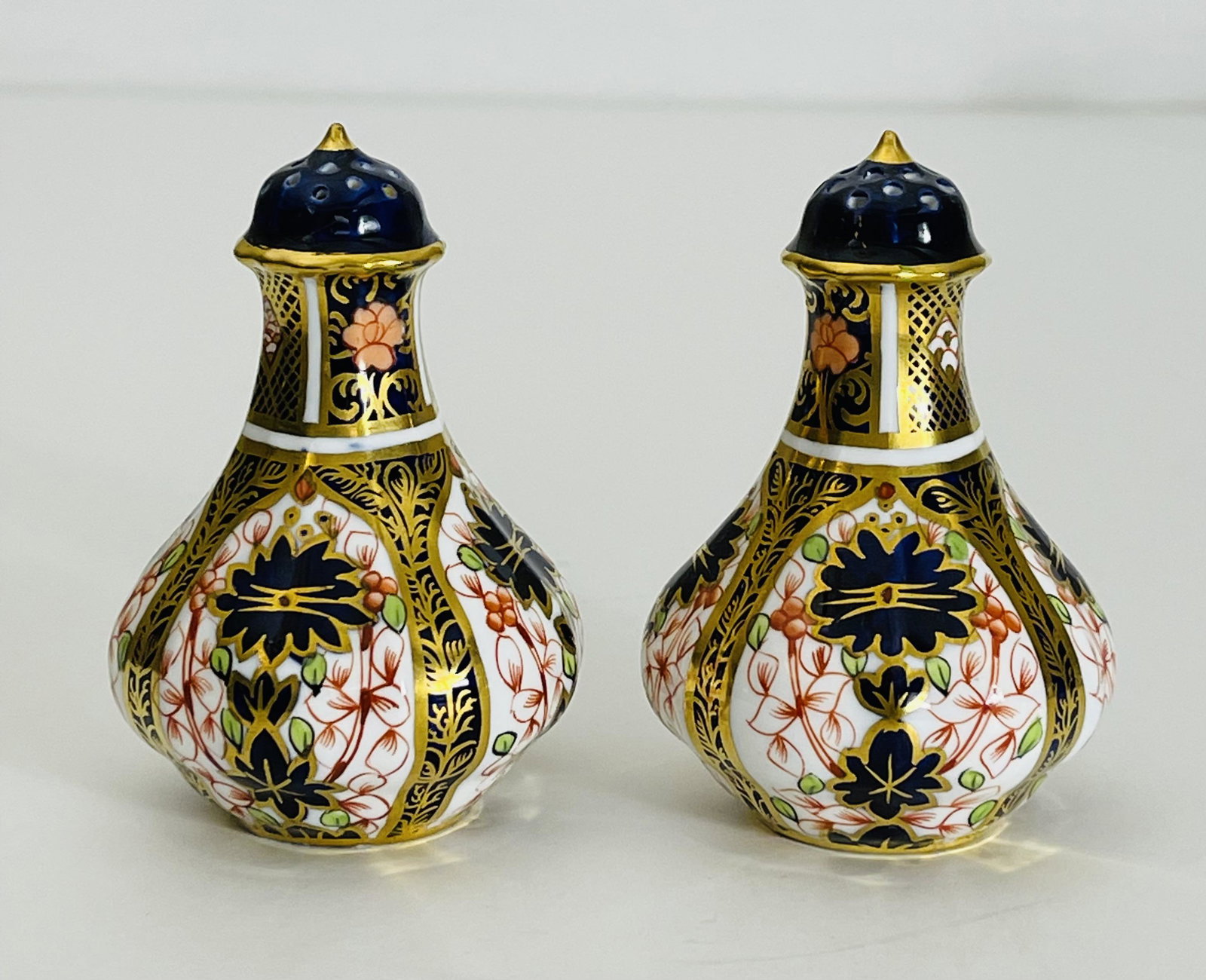 Royal Crown Derby Old Imari Set (2) Pepper and Salt: Royal Crown Derby Old Imari Set (2) Pepper and Salt, signed to base. each 3.50 "H x 2.50" W (in).