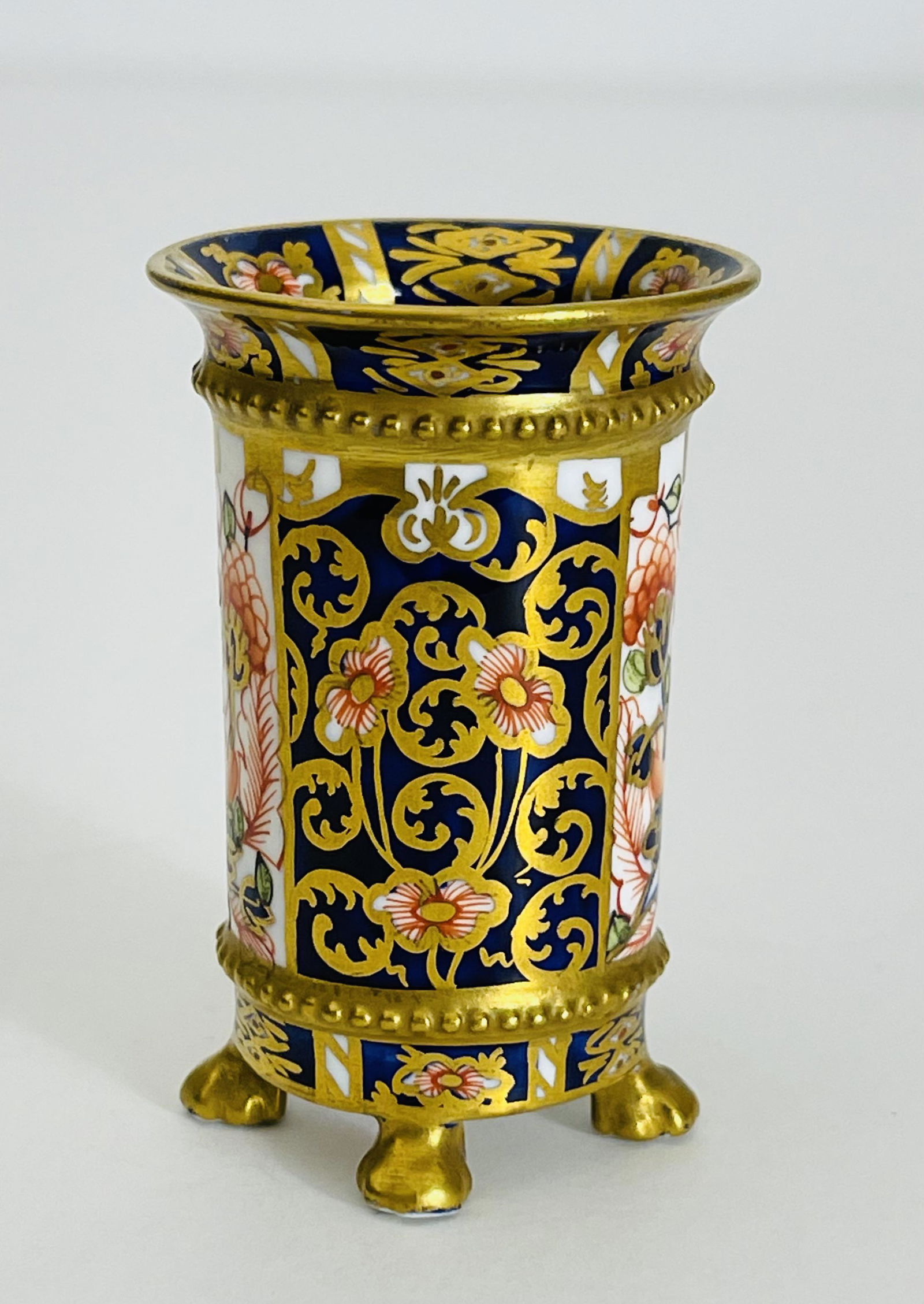Royal Crown Derby Old Imari Toothpick holder with 4: Royal Crown Derby Old Imari Toothpick holder with 4 legs, signed to base. 2.50 "H x 1.75" W (in).