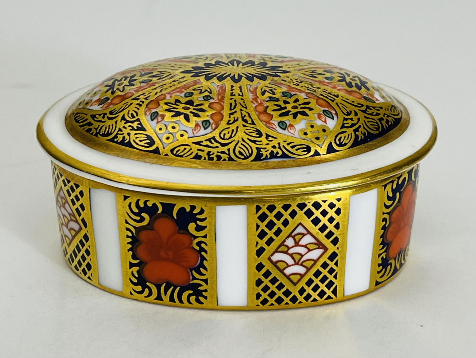 Royal Crown Derby Old Imari Pill Box: Royal Crown Derby Old Imari Pill Box, signed to base. 1 "H x 2.50" W (in).