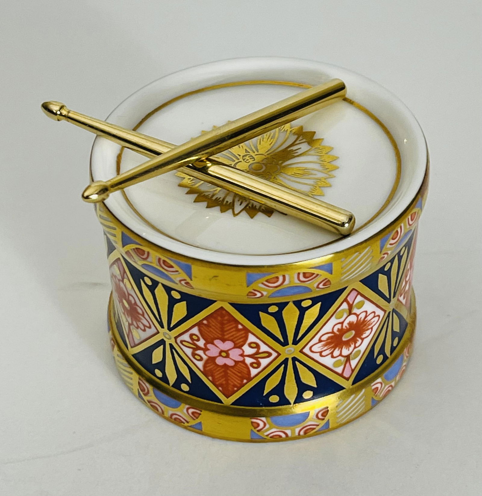 Royal Crown Derby Old Imari Drum with Drumsticks: Royal Crown Derby Old Imari Drum with Drumsticks, signed to base. 1.50 "H x 2.25" W (in).