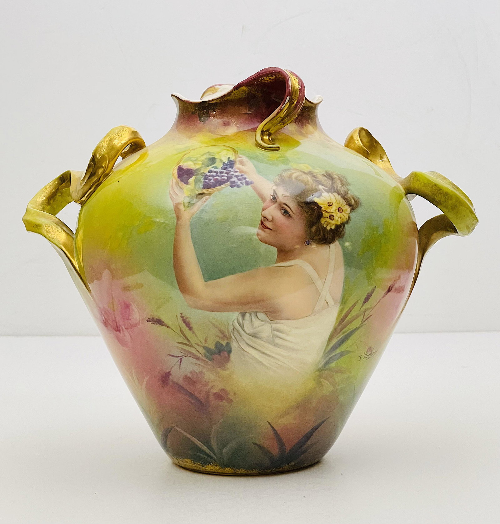 19th Century Royal Bonn Vase: 19th Century Royal Bonn Vase With a scene of a woman with fruits, hand painted, with 24k gold leaf, signed. Royal Bonn markings below. 11 "H x 13" W (in).
