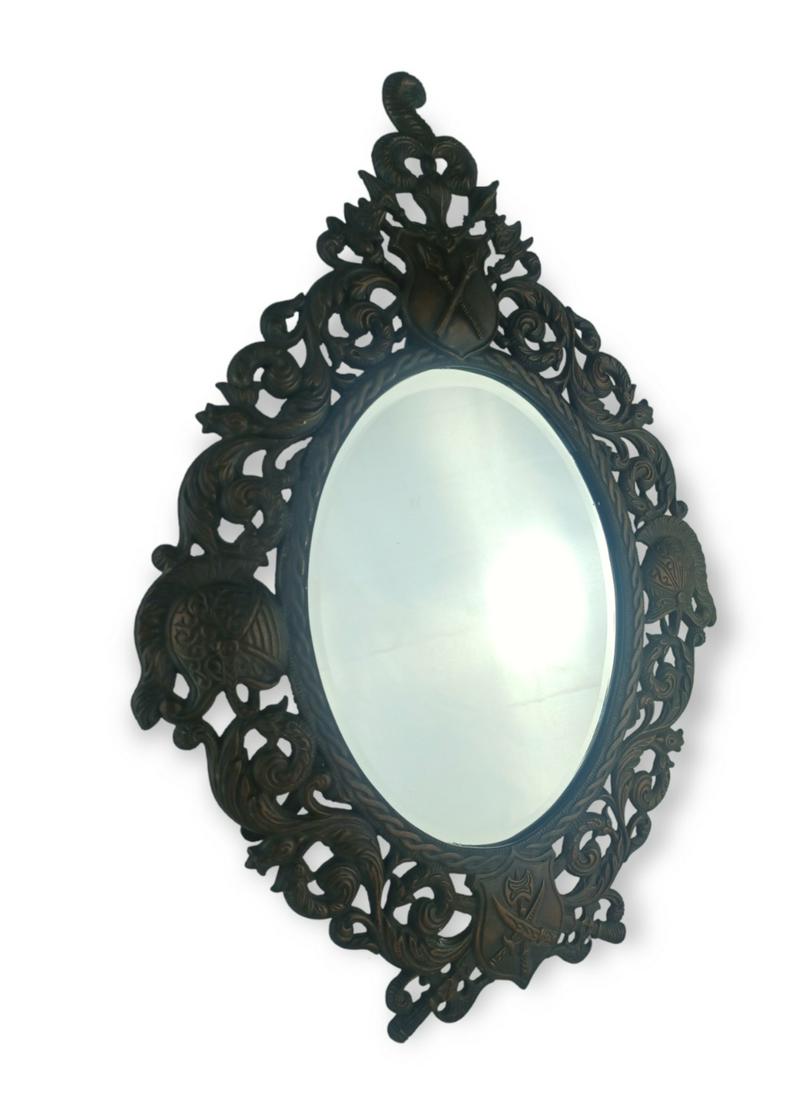 Vintage Spanish Style Bronze Table Mirror: Beautiful Ornate work aorund it with scrolls, sheilds, swords, and knight helmets. approx 16.5" x 12". Collection Of Miguel A. Cruz Peraza