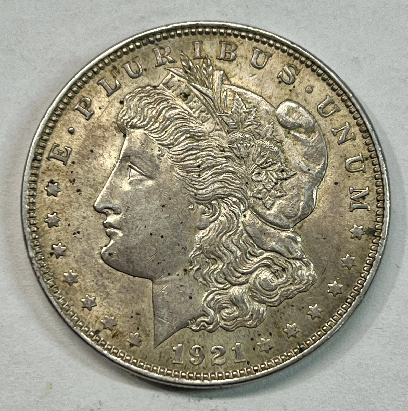 1921 US Silver Morgan Dollar Coin.: 1921 US Silver Morgan Dollar Coin. Please look at photos provided for condition. You will receive the actual Coin in the photo.