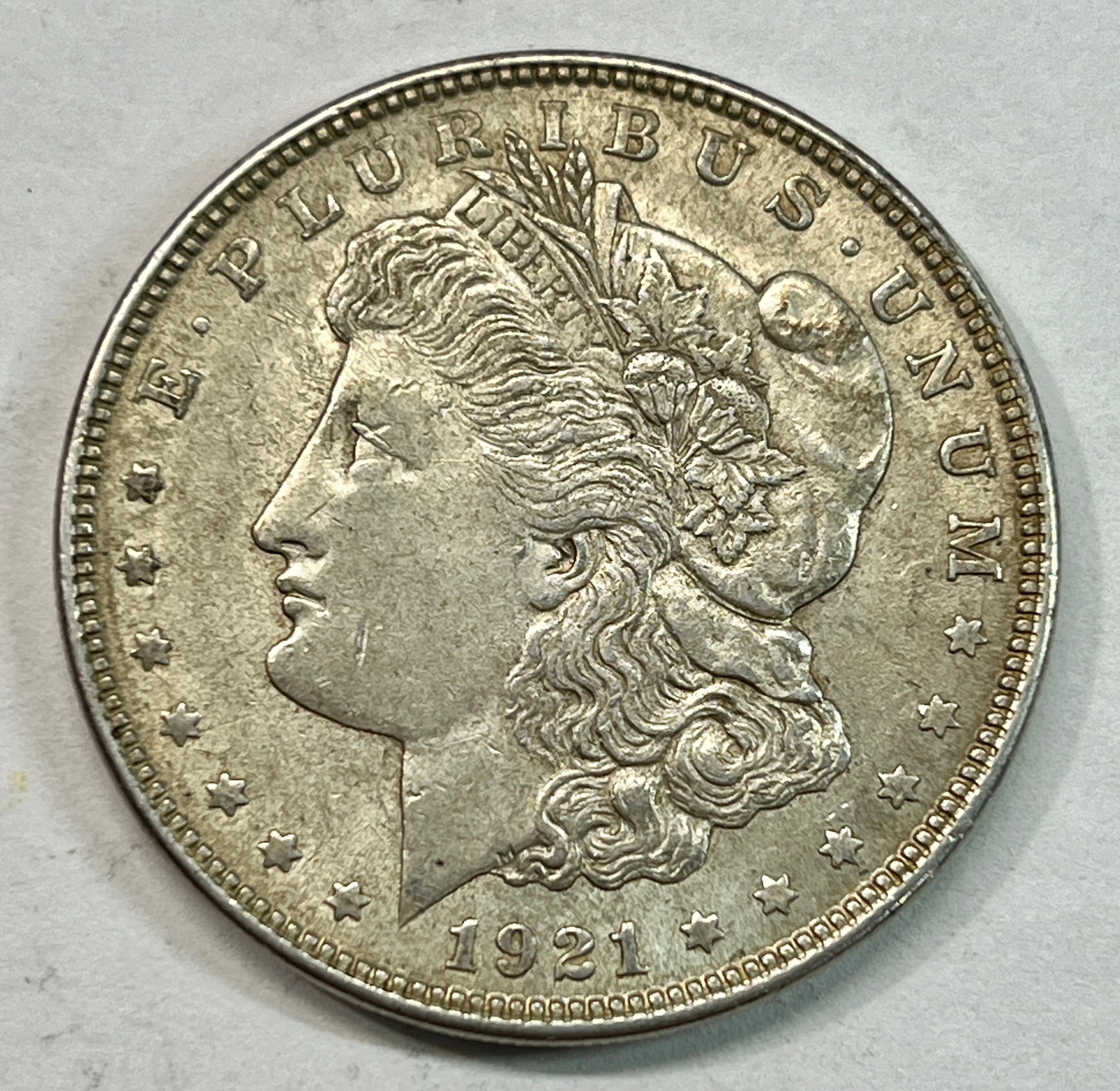 1921 US Silver Morgan Dollar Coin.: 1921 US Silver Morgan Dollar Coin. Please look at photos provided for condition. You will receive the actual Coin in the photo.