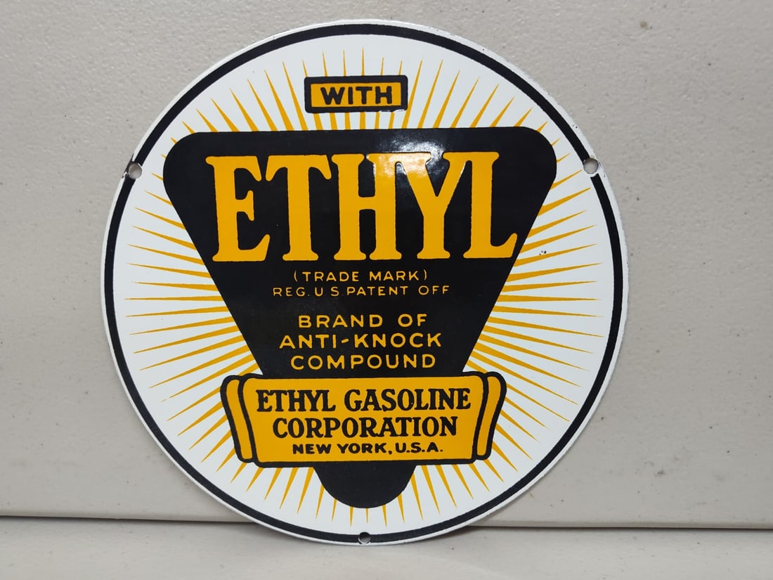 Porcelain Ethyl Advertising Sign / Pump Plate.: Porcelain Advertising Sign / Pump Plate. Measures approx 8 inches in diameter. Please examine photos. We are unsure of age, selling as is. Recently out of a local private collection.