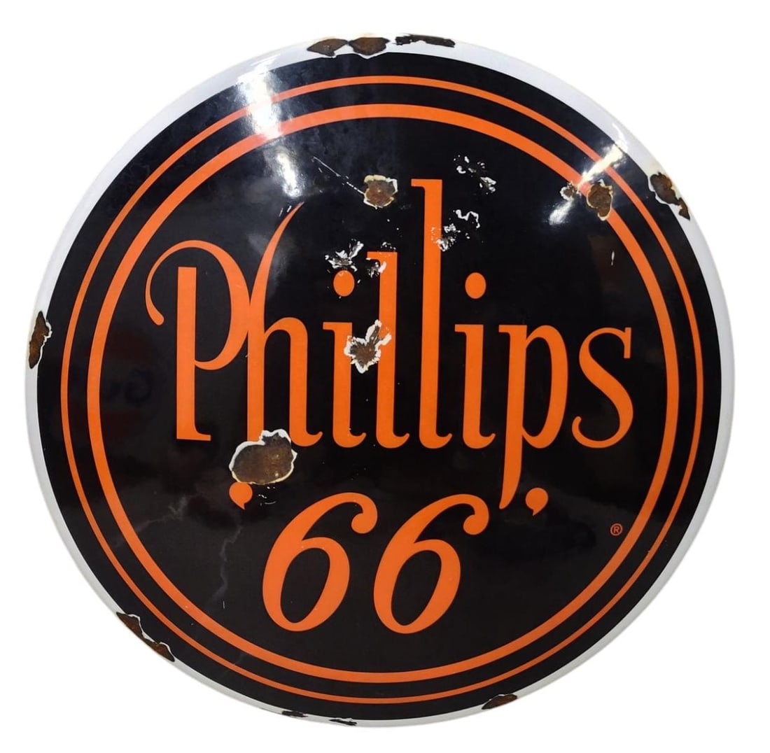 Porcelain Phillps 66 Button Style Advertising Sign.: Porcelain Advertising Button Style Sign. Measures 14 inches in diameter. Please examine photos. We are unsure of age, selling as is. Recently out of a local private collection.