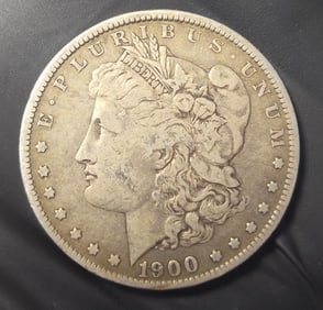 1900 O US Morgan Silver Dollar.