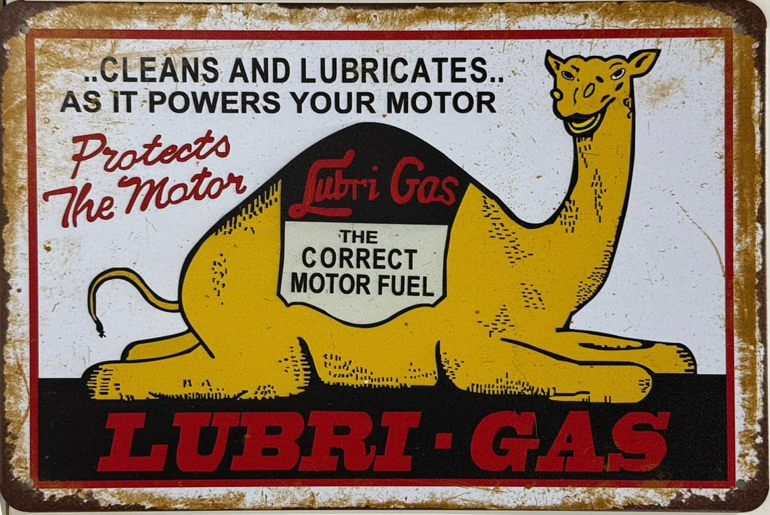 Tin Lubri-Gas Protects the Motor Advertising Sign.: Tin Lubri-Gas Protects the Motor Advertising Sign. A piece that was made purely for decoration. Looks great in a garage or man cave. Measures 12" h x 8" w (in). Excellent condition.
