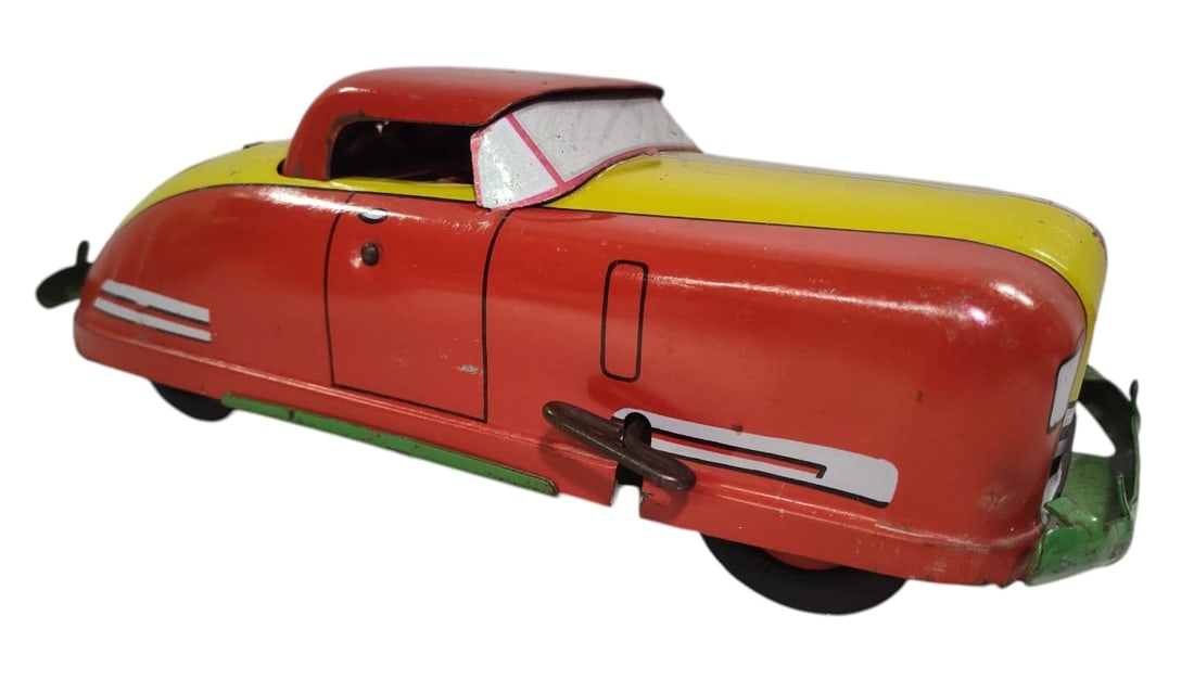 Wyandotte Toys Pressed Steel Red & Yellow Wind Up Toy Car.: Wyandotte Toys Pressed Steel Red & Yellow Wind Up Sportsman Convertible WY-651. Approx 13" Long. Wind up works as well as the top goes up and down, and trunk opens.