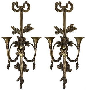Pair of antique, Louis XVI style, solid bronze, two-armed wall sconces, 1920s.: Pair of antique, Louis XVI style, solid bronze, two-armed wall sconces, 1920s. Dimensions: 27&rdquo; high x 11&rdquo; wide x 7&rdquo; deep inches. Made in France. Excellent condition.