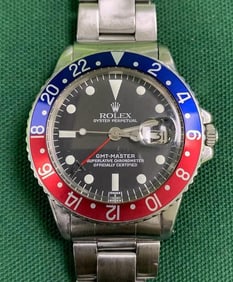 Vintage Rolex GMT Master 40mm, Mens Watch 1675, ca 1971-72.