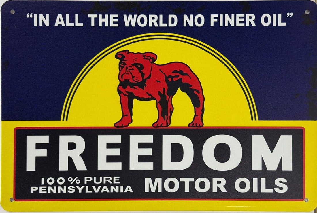 Tin Freedom Motor Oils Advertising Sign.: Tin Freedom Motor Oils Advertising Sign. Looks great in a garage or man cave. Measures 12" h x 8" w (in). Excellent condition.