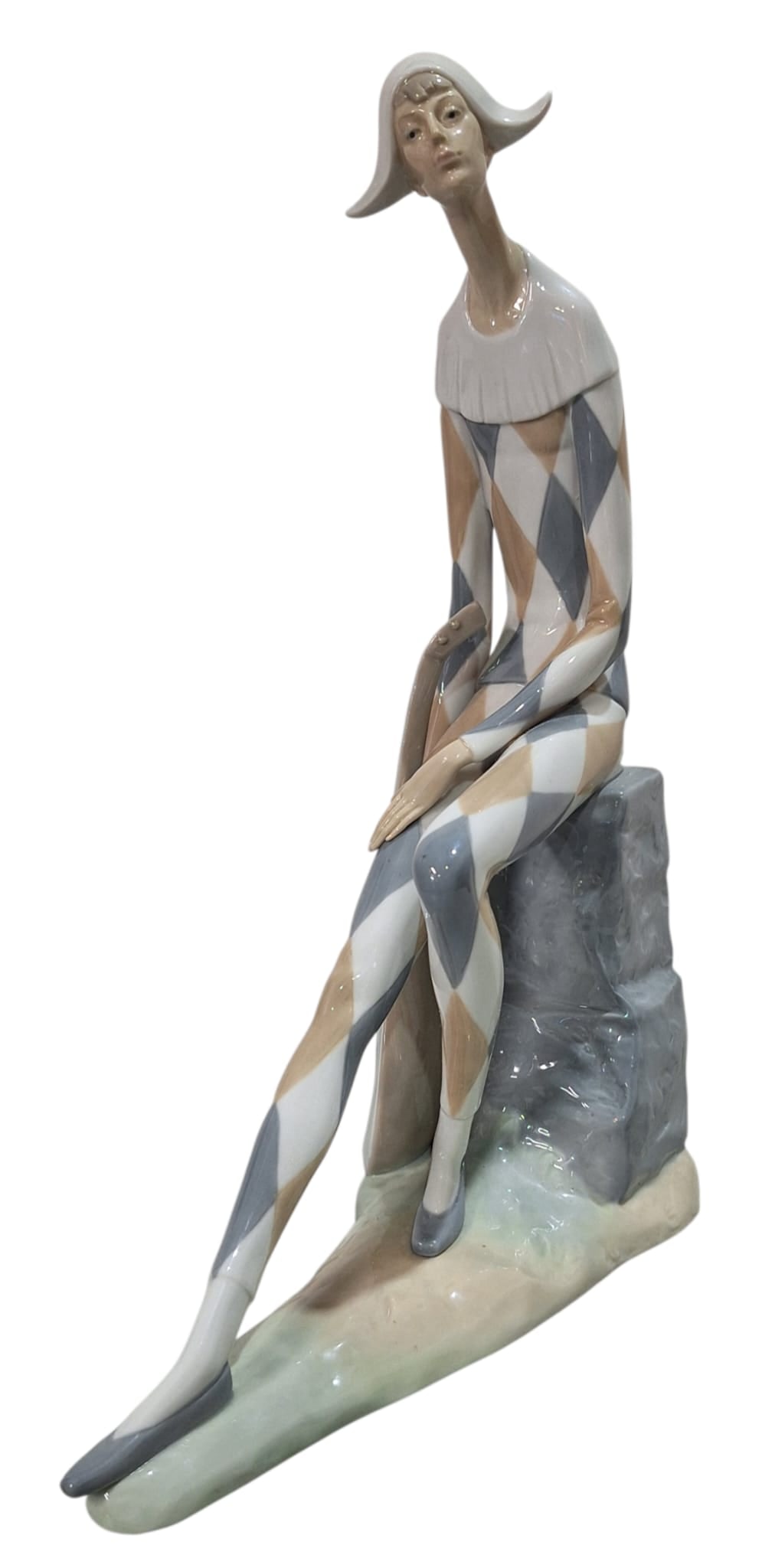 Sad Harlequin NAO by Lladro.: NAO by Lladro Collection, Triste Arlequin, NAO, porcelain with a glazed finish. Ref. 02000028. Sculptor Salvador Furió. Measurements: 14.25" high x 10.50" wide (inches). In perfect state. With origin