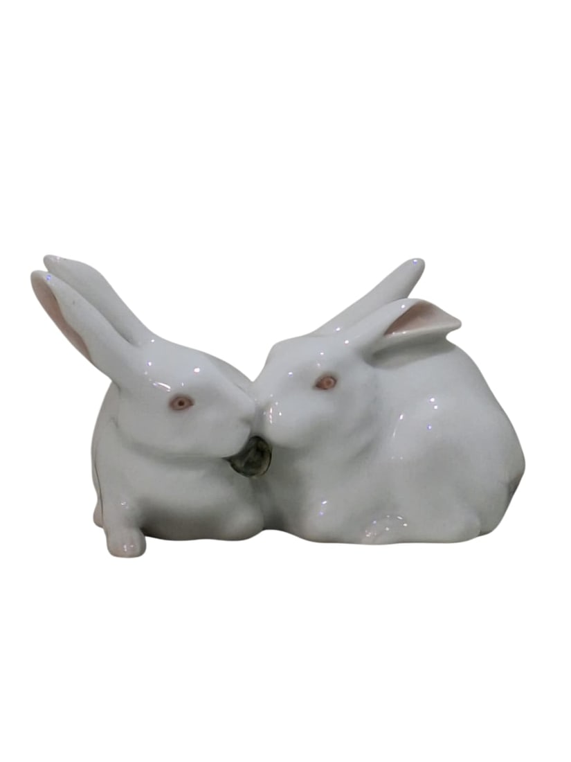 Royal Copenhagen Porcelain Bunnies / Rabbits Figurine, #518, circa 1943.: Royal Copenhagen porcelain figurine No. 518: Rabbits by Arnold Krog. Royal Copenhagen figurine of rabbits eating. Royal Copenhagen bunnies. Measurements: 2" h x 4" w inches. circa 1943. This piece is 