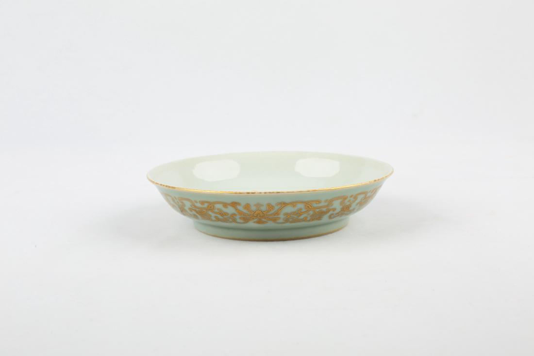 A CHINESE CELADON PORCELAIN PLATE (1 of 5)