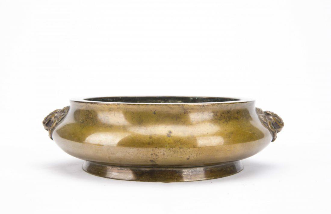 A Chinese Bronze Incense Burner: Diam. 19 cm,Â Ht. 5 cm