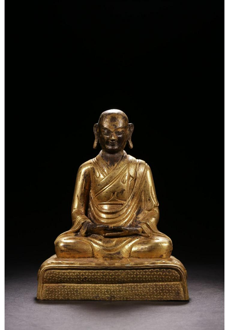 A Chinese Gilded Bronze Panchen Seated Statue (1 of 9)