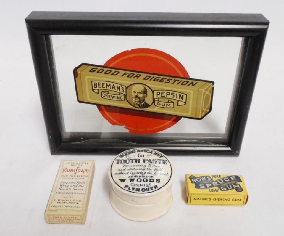 Lot of Advertising Items: "Beeman's Pepsin Chewing Gum" framed glass ad NOTE: DAMAGE MISSING PORTION OF AD, "Rows Pure Spruce Lump Gum" box, and 2 teeth whitening products 1 cardboard box and 1 porcelain jar
