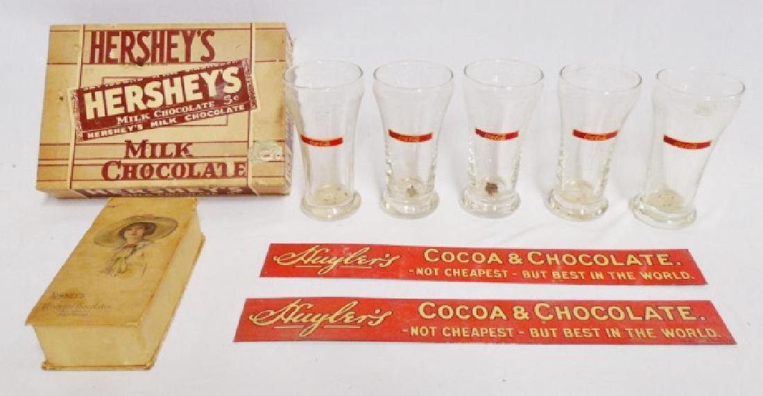 Lot of Chocolate/Coke Boxes/Signs/Glasses: Hershey's Milk Chocolate" box, "Lowney's Assorted Chocolates" box, 2 tin "Cocoa and Chocolate" signs both measure 13 7/8" L x 1 13/16" W, and 5 "Coca Cola Glasses