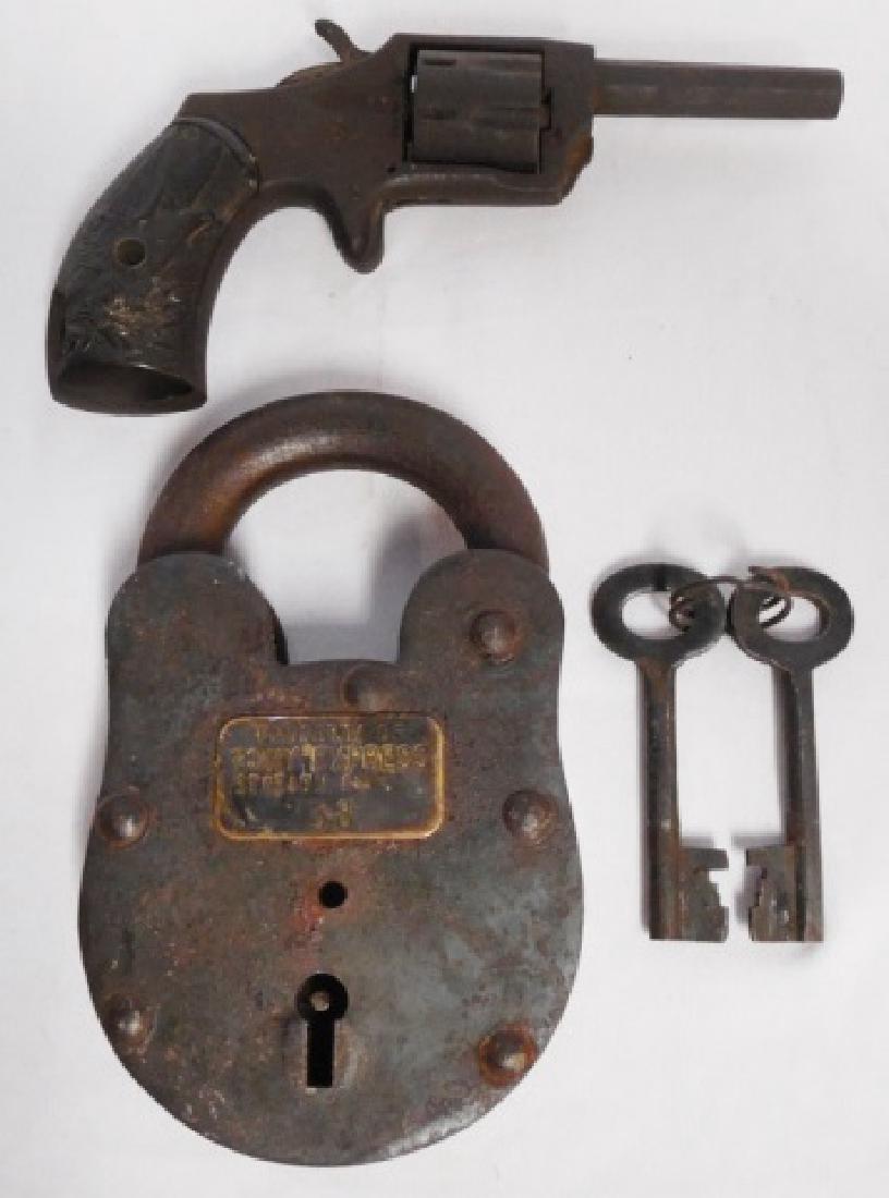 Padlock with Keys and Iron Toy Gun: "Pony Express Station #58" padlock with keys and an iron toy gun with plastic grip NOTE: DAMAGE ONE SIDE MISSING CORNER