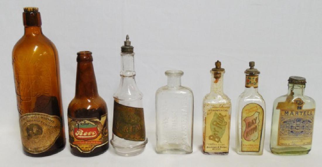 Lot of 7 Whiskey, Rum, Cognac, and Beer Bottles: bottles