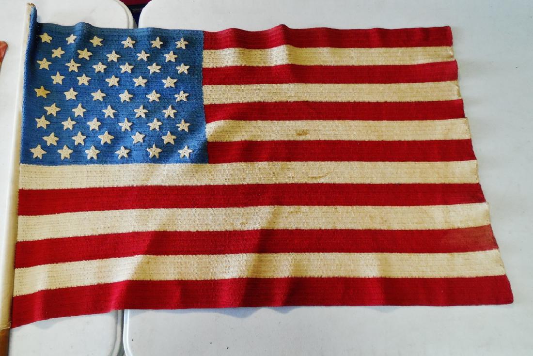 Lot of 3 Patriotic American Flags: tallest measures 58" H and NOTE: DAMAGE TO FLAGS
