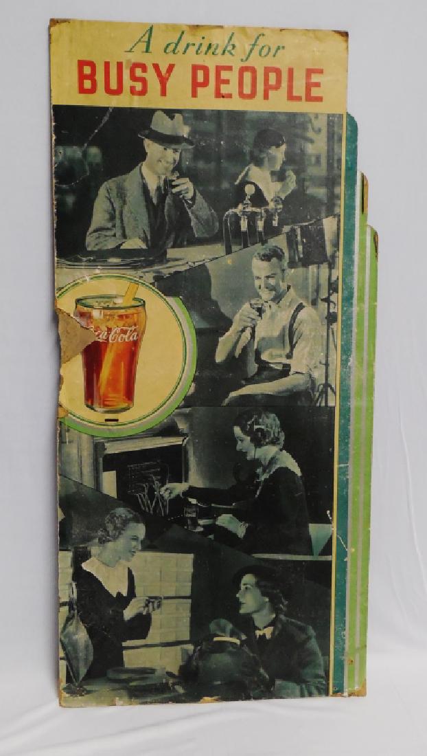Coca-Cola Cardboard Advertisement: "A Drink for Busy People" measures 43" H x 20 1/4" W NOTE: DOES HAVE DAMAGE