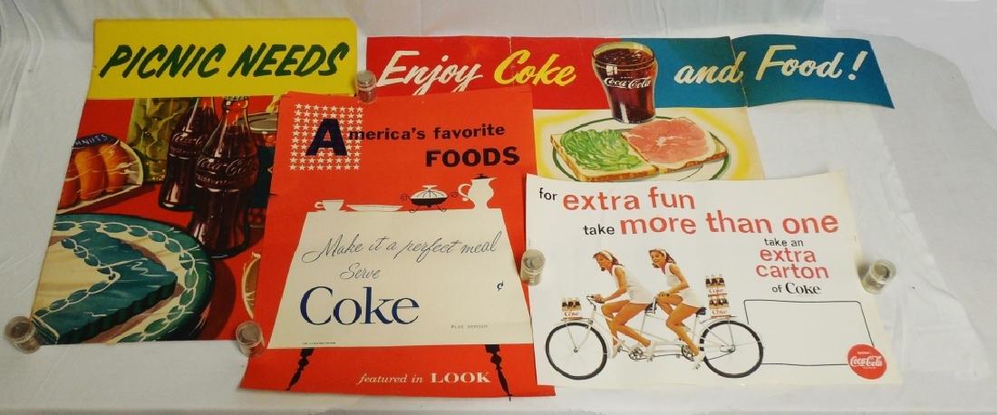Lot of 4 Coca-Cola Poster Advertisements: "America's Favorite Food" poster measures 22" H x 17" W NOTE: TEARS AND TAPE REPAIR PRESENT ON ALL ADS