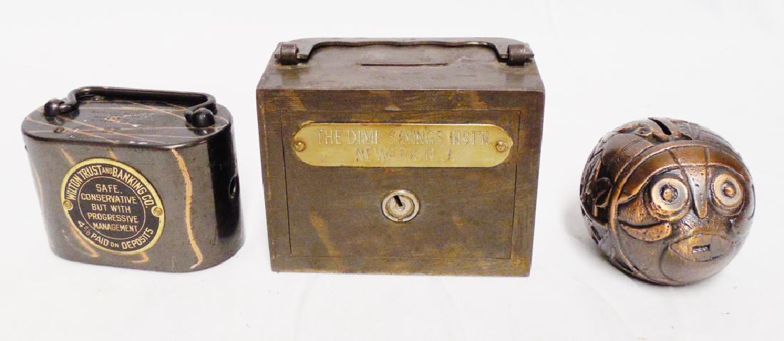 Lot of 3 Metal Banks: Includes a Gaugin Carved Coconut Bank with Box and Booklet with details and the Wilton Trust is both a coin and paper money bank