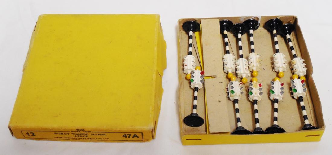 Lot of 11 Cast Iron Dinky Robot Traffic Signals: 4-Face with box NOTE: MISSING ONE BOX IS OF 12, IS INCOMPLETE