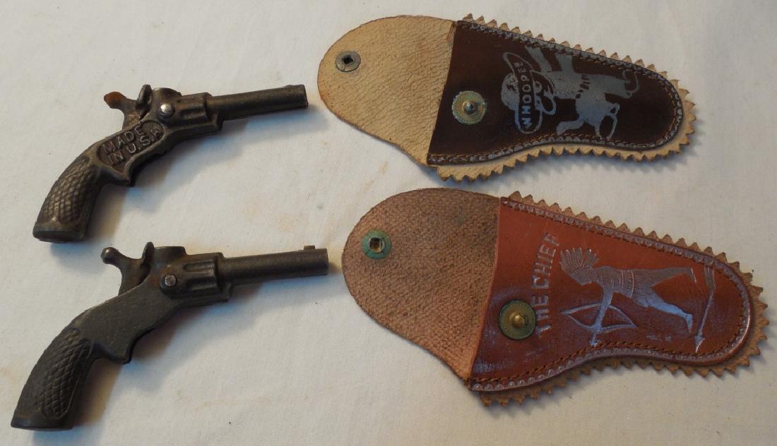 2 Small Cap Guns w/ Holsters (1 of 2)