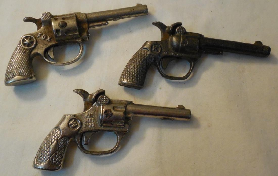 Lot of 3 Early Cap Guns: Fox, Spy, and Jax