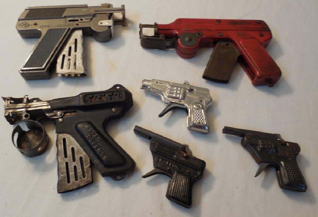 Lot of 6 Tin Cap Guns: including Super Automatic, Super Defense, S. Wallow, Hawk, and more