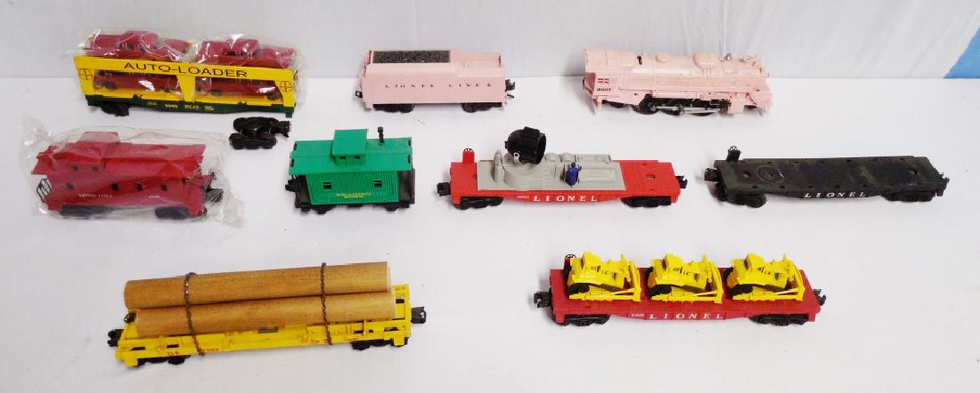 Lot of 9 Lionel Trains: NOTE: ENGINE AND TENDER BOTH REPAINTED, AUTOLOADER HAS WHEELS UNATTACHED, AND TRACK MAINTENANCE SPOTLIGHT IS MISSING LENS